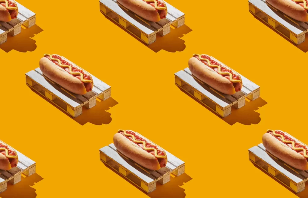 hot dogs on yellow background minimalism