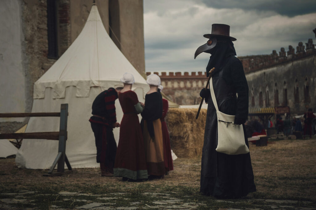 A,Masquerade,Historical,Scene,Reconstruction.,Plague,Doctor,In,Medieval,Old